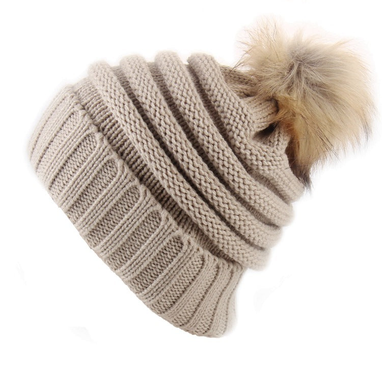 Gorro con vuelta y pompón de pelo – foto 6