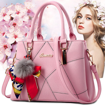 Bolso de mano con colgante de pelo – foto 2