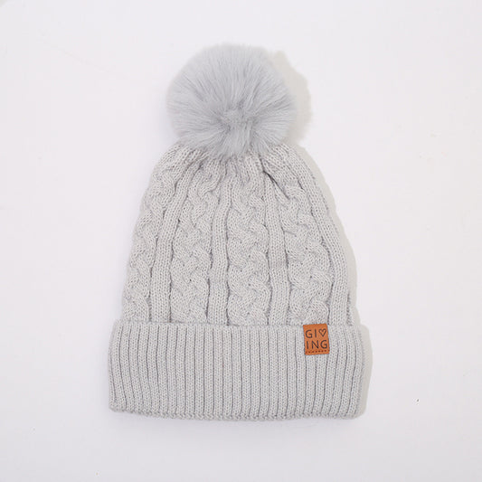 Gorro trenzado forrado con pompón de pelo – foto 2