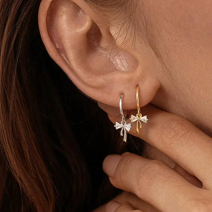 Pendientes de lazo con circonitas – foto 3