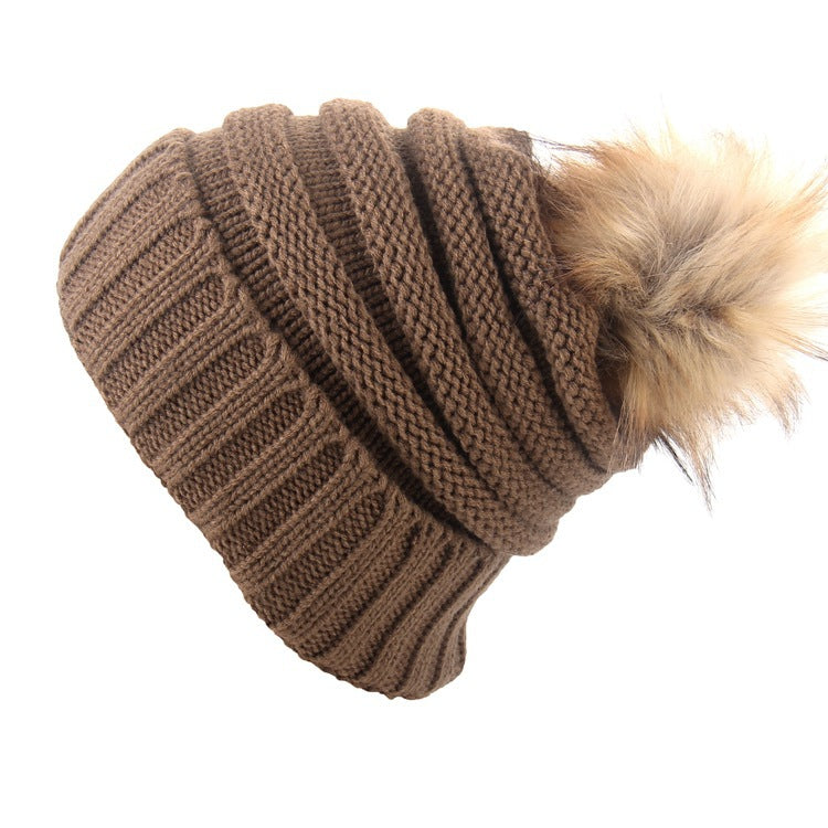 Gorro con vuelta y pompón de pelo – foto 5
