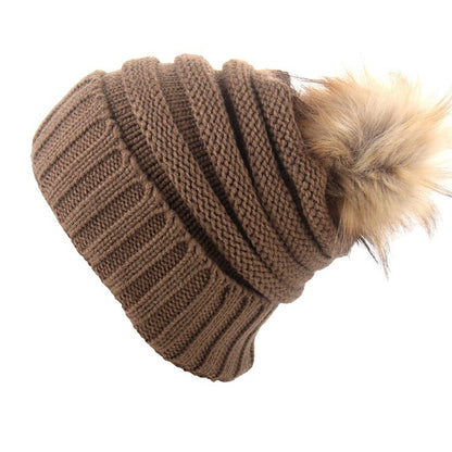 Gorro con vuelta y pompón de pelo – foto 5