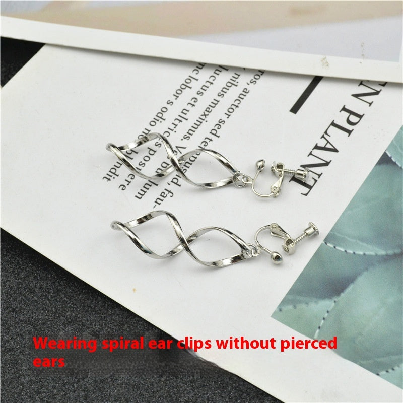 Pendientes trenzados de plata en espiral – foto 9