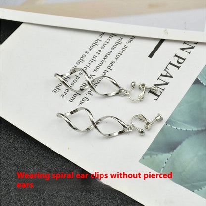 Pendientes trenzados de plata en espiral – foto 9