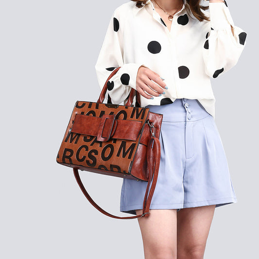 Bolso de mano con letras – foto 2