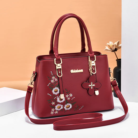 Bolso de mano con flores