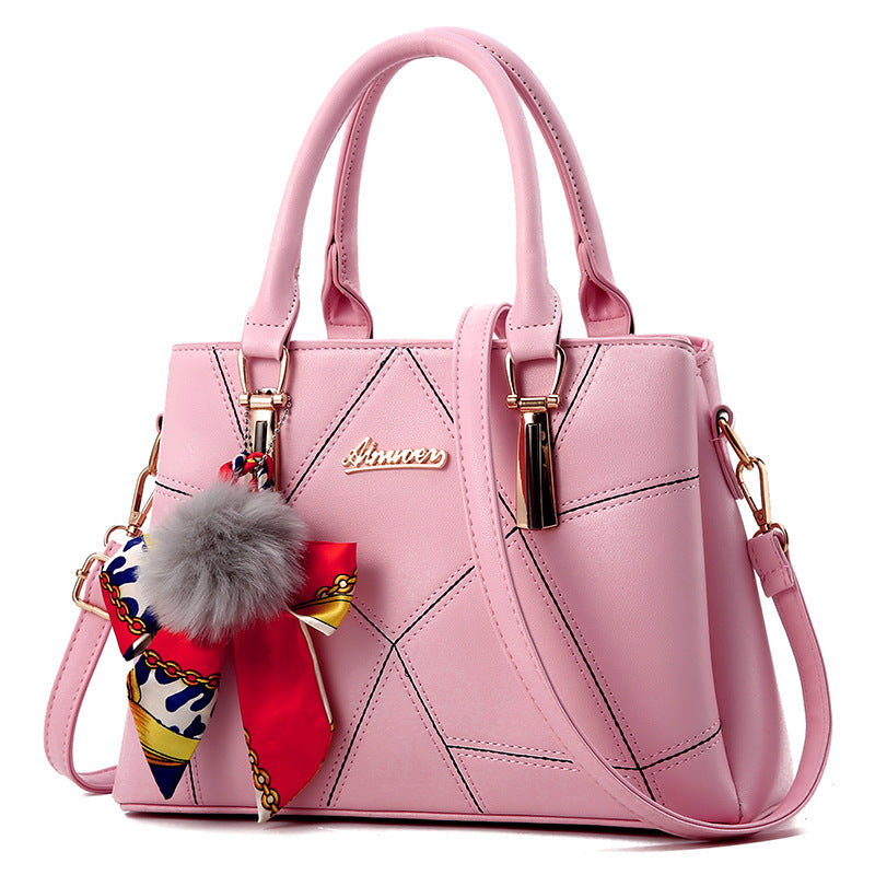 Bolso de mano con colgante de pelo – foto 9