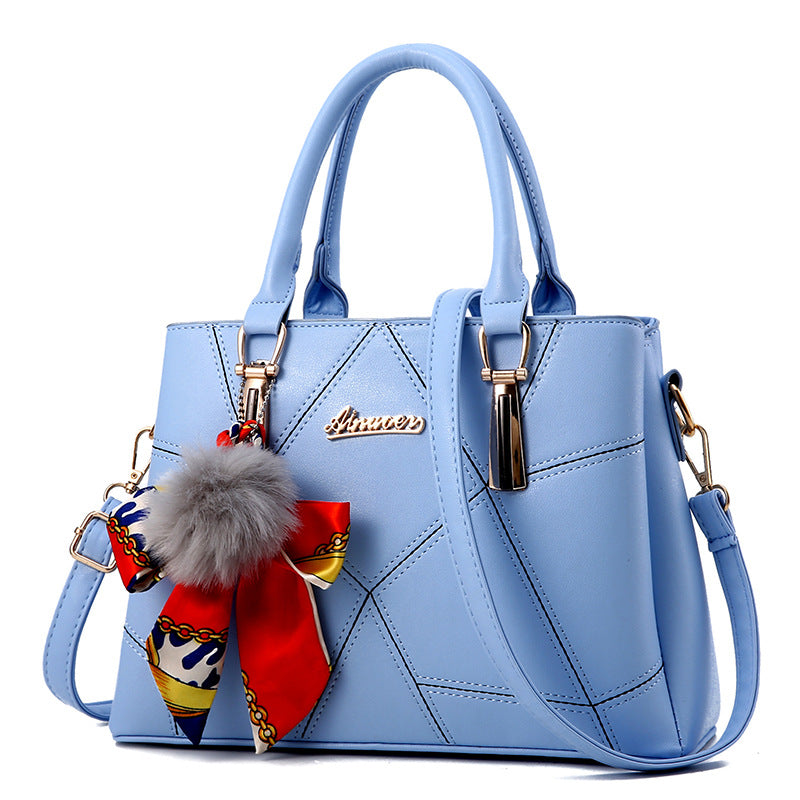 Bolso de mano con colgante de pelo – foto 10