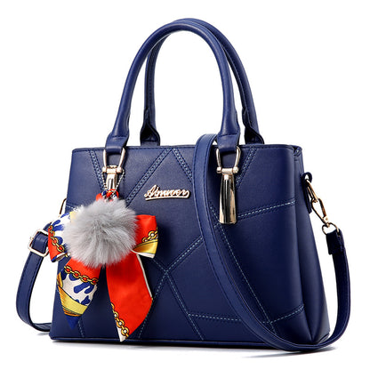 Bolso de mano con colgante de pelo – foto 11