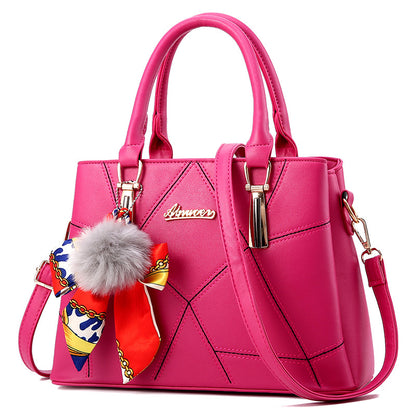 Bolso de mano con colgante de pelo – foto 12
