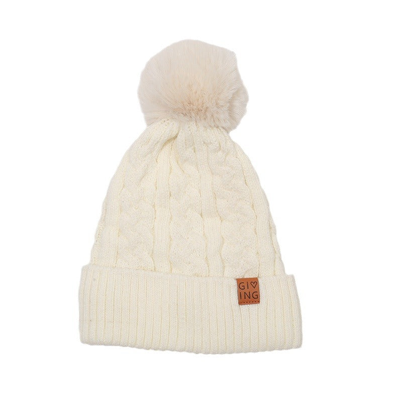 Gorro trenzado forrado con pompón de pelo – foto 3
