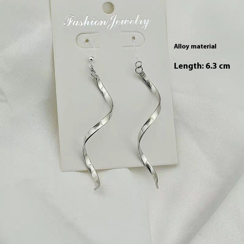 Pendientes trenzados de plata en espiral – foto 4