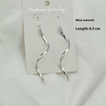 Pendientes trenzados de plata en espiral – foto 4