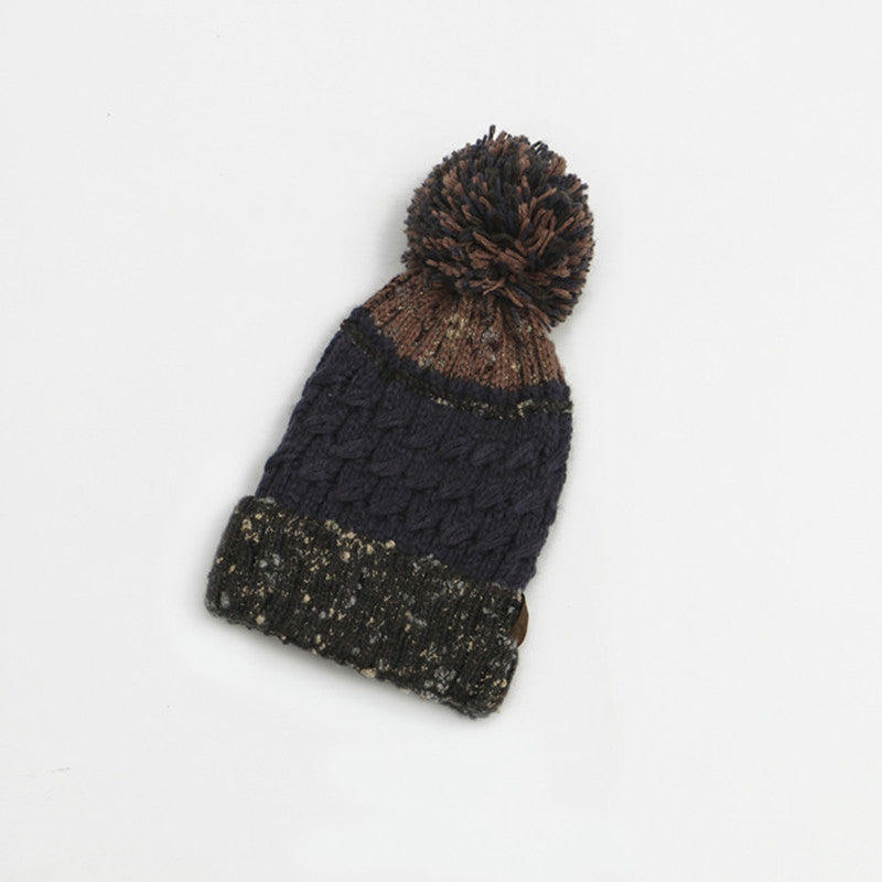 Gorro con pompón en bloques de color – foto 7