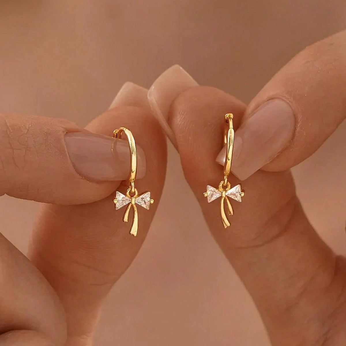 Pendientes de lazo con circonitas – foto 2