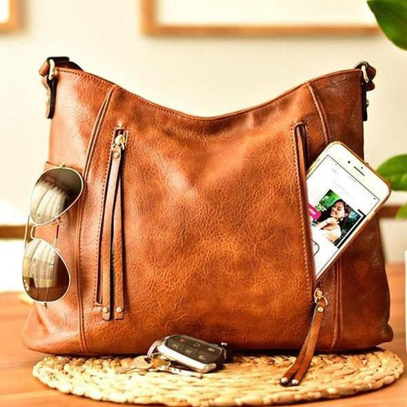Bolso hobo con borla