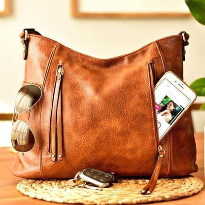 Bolso hobo con borla