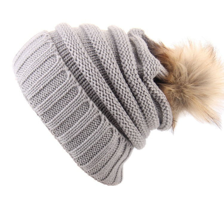Gorro con vuelta y pompón de pelo – foto 3