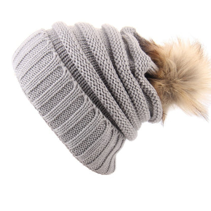 Gorro con vuelta y pompón de pelo – foto 3