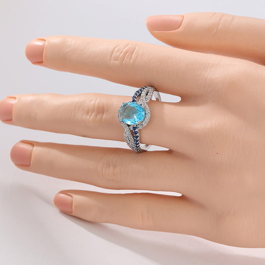 Anillo con cristal azul y circonitas