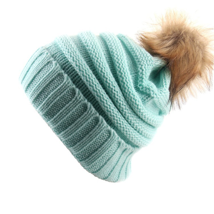 Gorro con vuelta y pompón de pelo – foto 4