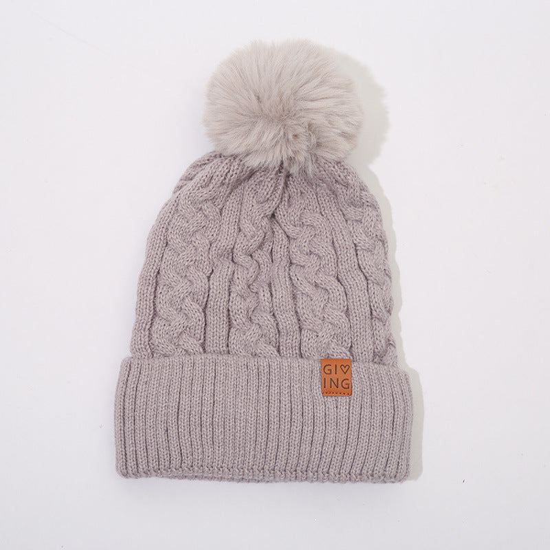 Gorro trenzado forrado con pompón de pelo – foto 9