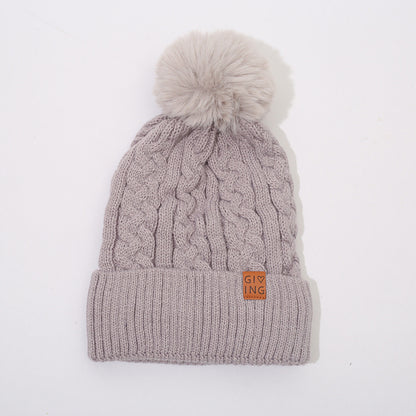 Gorro trenzado forrado con pompón de pelo – foto 9