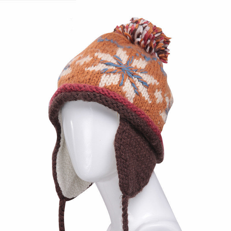 Gorro nórdico con orejeras y pompón – foto 3