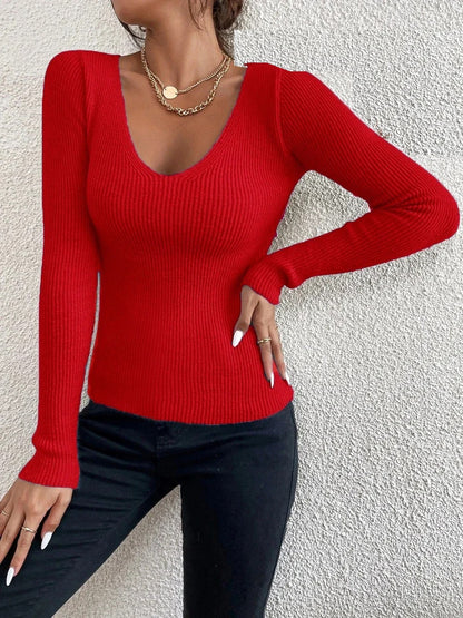 Jersey de canalé con escote de pico rojo